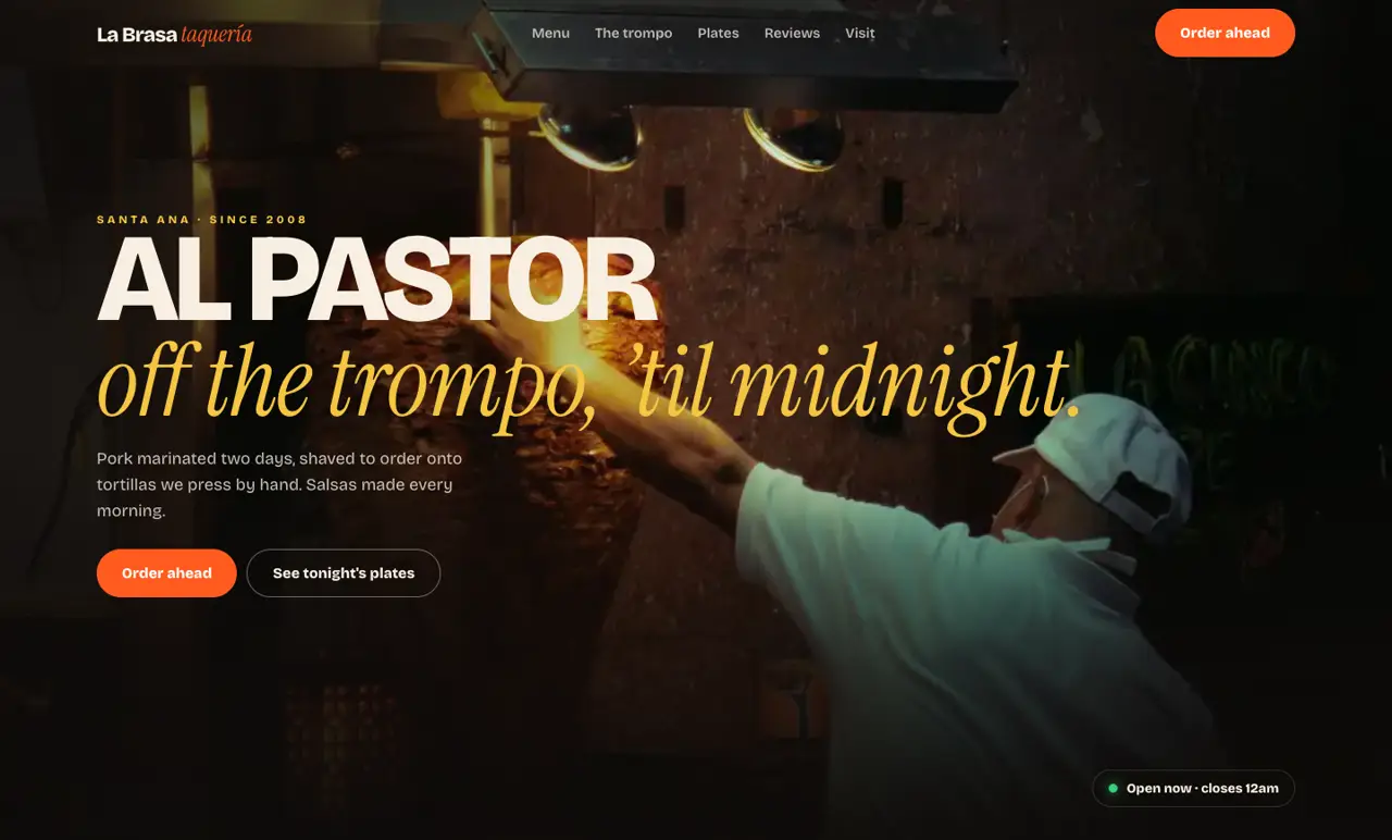 Restaurant website hero with al pastor on the trompo